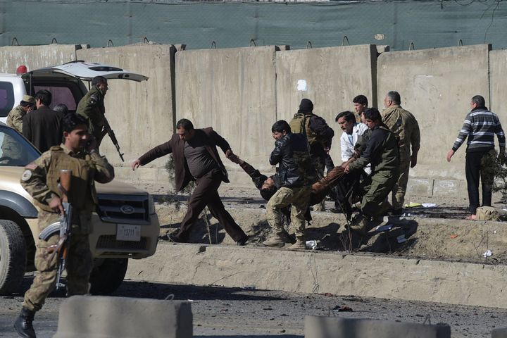 A suicide car bomb rocked a police base in central Kabul on January 2, leaving several bodies strewn around the area.