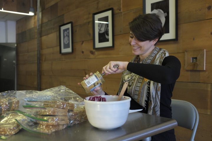Jessica Olah, honoring her mother's devotion by making thousands of sandwiches. 