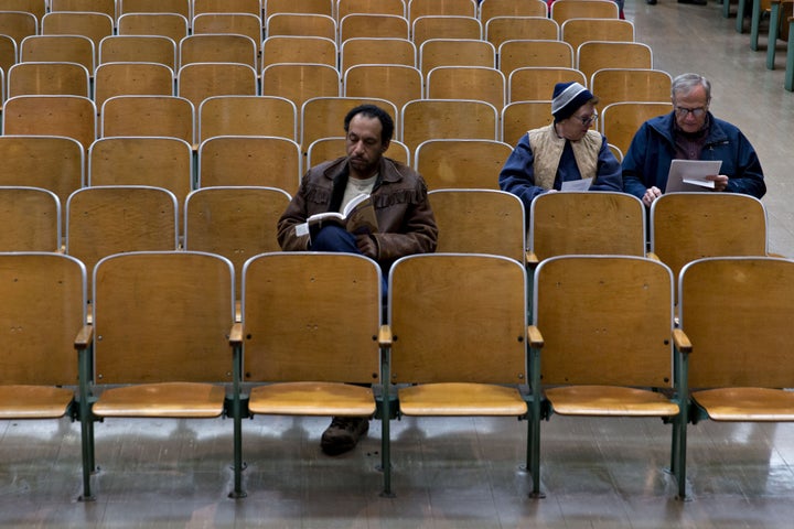 Caucus-goers sit in the Brody Middle School auditorium before casting their vote for a Republican presidential candidate ahead of the first-in-the-nation Iowa caucus in Des Moines, Iowa, on Monday.