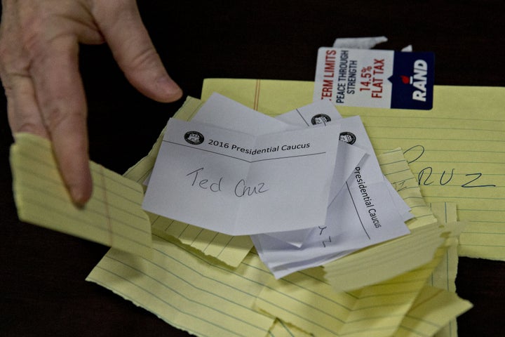 Paper ballots for Senator Ted Cruz are dispersed during the first-in-the-nation Iowa caucus in the Brody Middle School cafeteria in Des Moines, Iowa on Monday, Feb. 1, 2016.