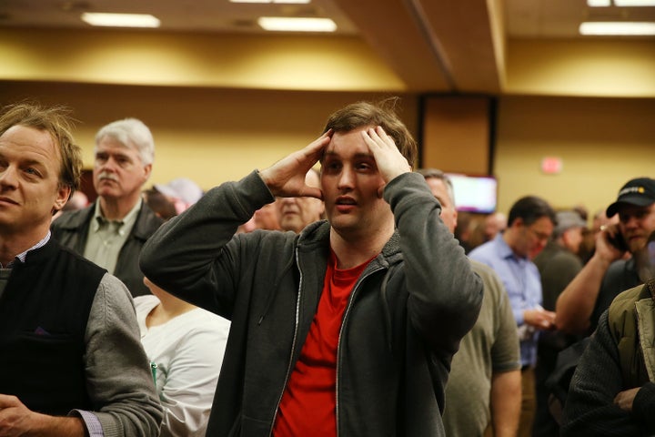 Robert Montgomery reacts to caucus return numbers at the Donald Trump for President Caucus Watch Party at the Sheraton Hotel on Feb. 1, 2016 in Des Moines, Iowa.