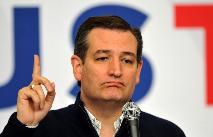 Republican presidential candidate Sen. Ted Cruz (R-Texas) conducts a Caucus Day rally on Monday in Jefferson, Iowa. Cruz defi