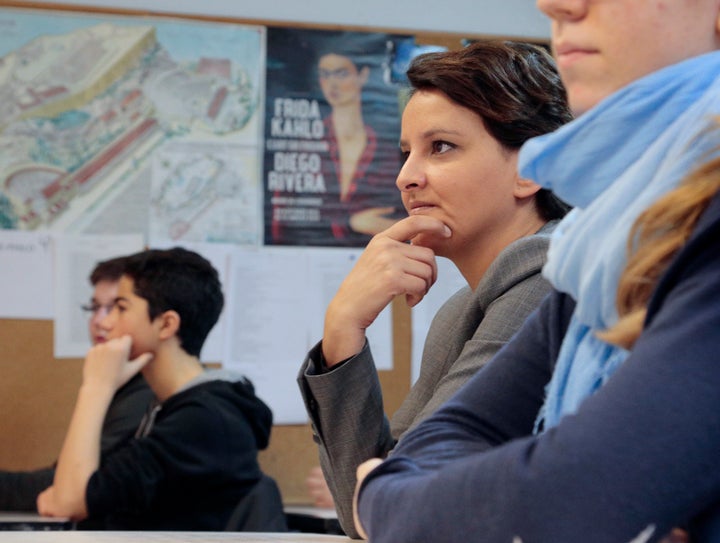 French Education Minister Najat Vallaud-Belkacem visits a secondary school in Paris on Jan. 7, 2016 to mark the implementation of a new curriculum designed to address radicalization and extremism.