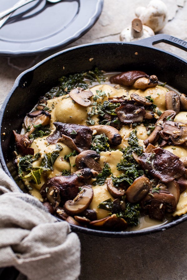 Taleggio Ravioli With Garlicky Butter Kale And Wild Mushroom Sauce 