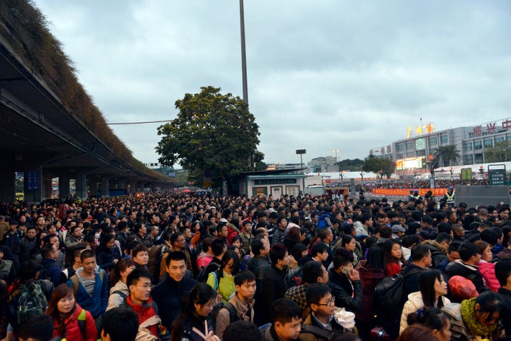 Icy weather has delayed several trains in China, stranding nearly 100,000 people in Guangzhou who were headed home for traditional family celebrations.