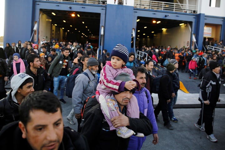 Syrian refugees arrive in Piraeus in passenger ships from Athens chartered by the Greek government. Greece is the main arrival point for refugees entering Europe by sea.