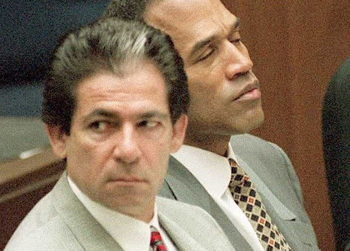 Robert Kardashian sits next to O.J. Simpson during his murder trial. 