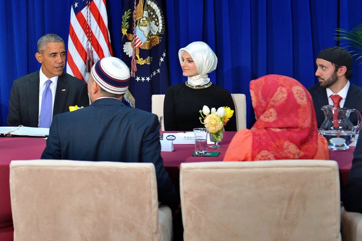 US President Barack Obama participates in a roundtable discussion with members of the Muslim community while visiting the Islamic Society of Baltimore Feb. 3, 2016 in Windsor Mill, Maryland.