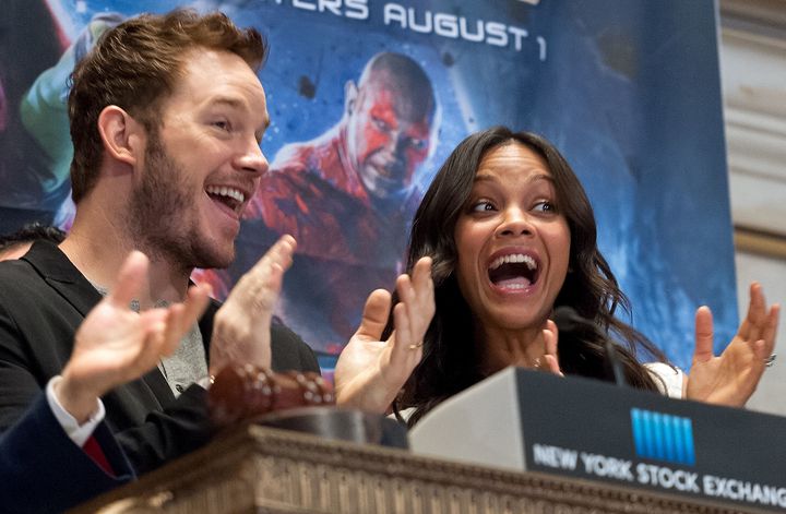 Chris Pratt and Zoe Saldana ring the opening bell at the New York Stock Exchange on July 29, 2014 in New York City. (Photo by D Dipasupil/FilmMagic)
