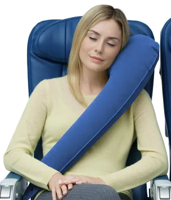 Head hammock' neck pillow helps you sleep on a plane