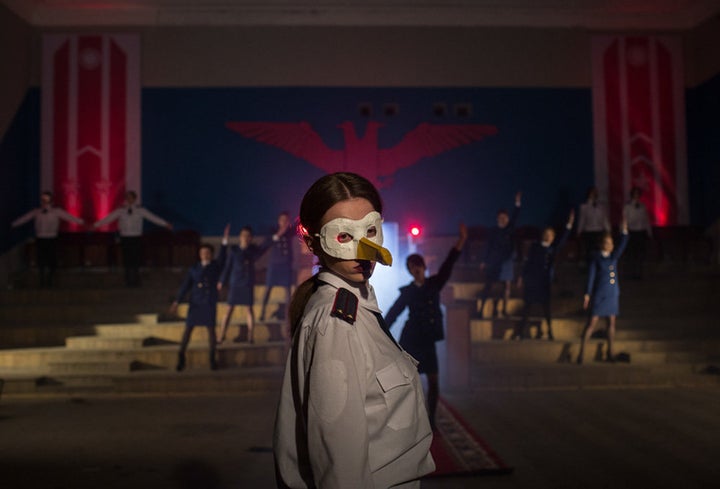 A still from the music video shows a band member in a seagull mask. The visual is symbolic, as "Chaika" translates to "seagul
