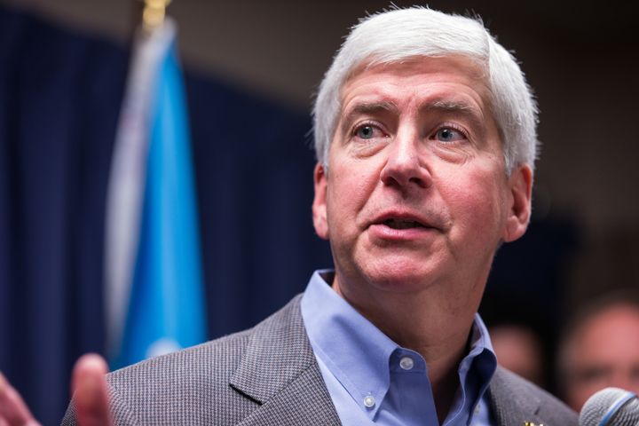 Michigan Gov. Rick Snyder speaks to the media regarding the status of the Flint water crisis on Jan. 27 at Flint City Hall in Flint, Michigan. The governor proposed spending $30 million in state funds to offset residents' water bills on Feb. 3.