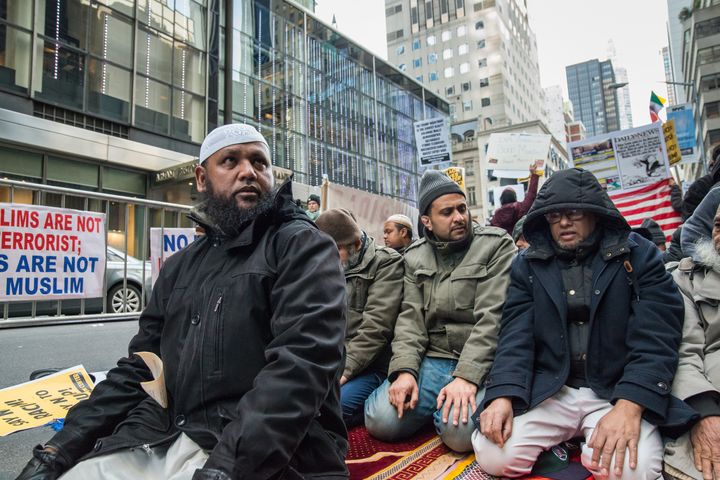 Muslim-American men from a local mosque pray in front of Trump Tower in New York City, Dec. 20, 2015.