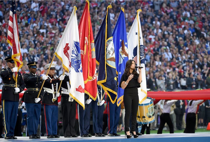 Idina Menzel sings the National Anthem prior to the start of Super Bowl XLIX on Feb. 1, 2015, at the University of Phoenix Stadium in Glendale, Arizona.