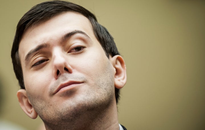 Embattled pharmaceutical entrepreneur Martin Shkreli shows off his "Poo Steel" pose during a hearing of the House Committee on Oversight and Government Reform on Feb. 4, 2016.