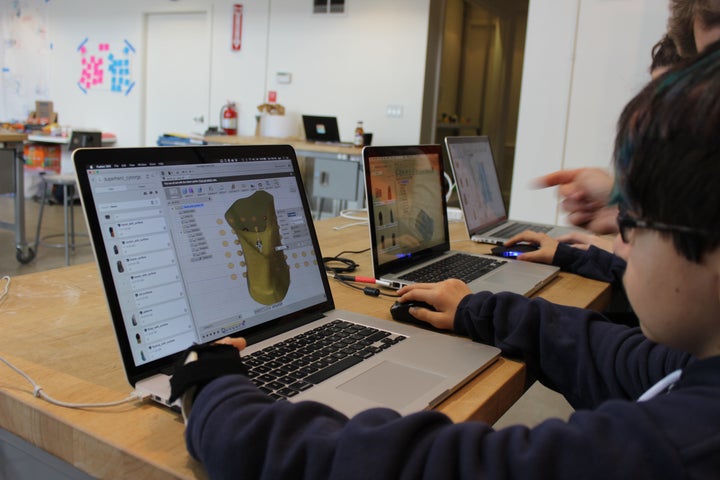 David, 13 years old, learning Autodesk’s Fusion360 CAD software to model his wearable prototype.