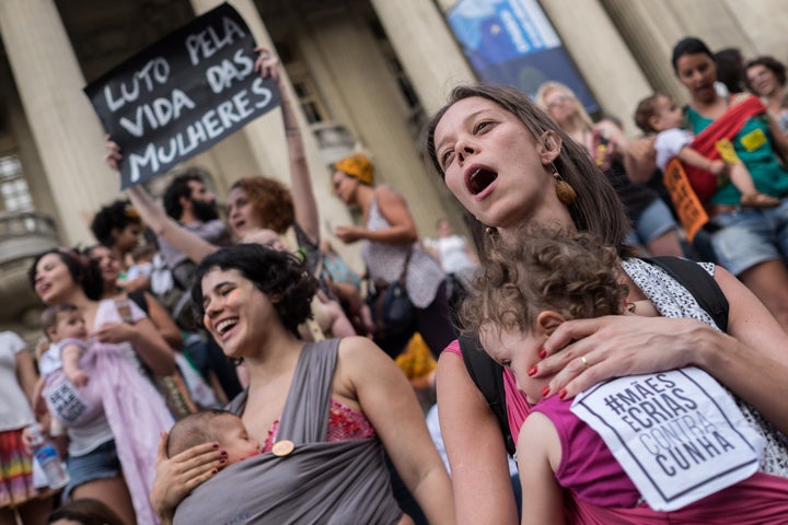 Brazilian women demonstrate in favor of abort legalization and against the president of the Brazilian Chamber of Deputies, Eduardo Cunha, in Rio de Janeiro downtown on November 11, 2015.