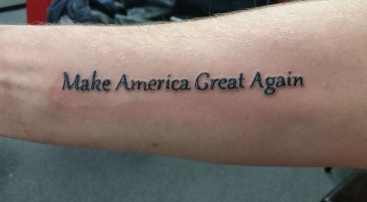 Donald Trump's campaign slogan is seen on someone's arm. The tattoo is part of an initiative in New Hampshire that gives free pro-Trump inks. 