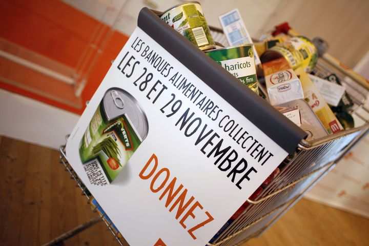 A trolley with food items is displayed in 2014 in front of Paris' city hall during the launch of the 30th collection for food banks. France's new law against food waste will provide millions more free meals every year, The Guardian reported.