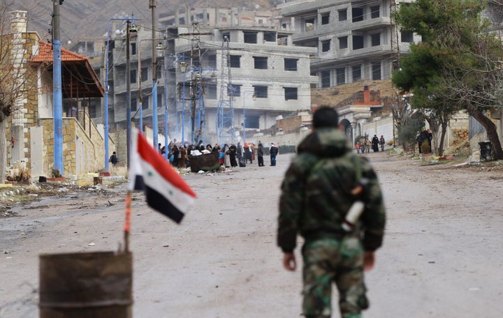 The entrance to Madaya as residents wait for an aid convoy on Jan. 14, 2016. Critics of the U.N. said it should do more to confront the regime over its siege tactics.