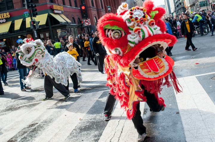 The Lion Dance is performed as the Chinese New Year parade makes its way down H Street during the Chinese New Year Parade in Chinatown on February 22, 2015 in Washington, DC.
