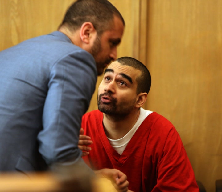 Derek Medina, right, who killed his wife and posted a photo of her body on Facebook, speaks to his attorney, Saam Zangeneh, a