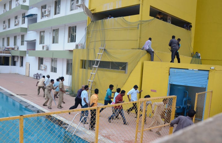 People run away as the leopard attacks.