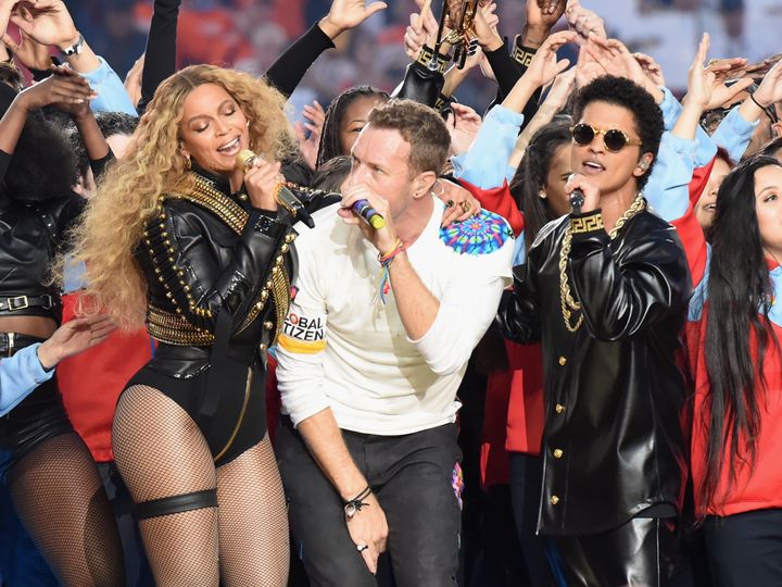 Beyonce, Chris Martin of Coldplay and Bruno Mars perform onstage during the Pepsi Super Bowl 50 Halftime Show at Levi's Stadium on February 7, 2016 in Santa Clara, California.