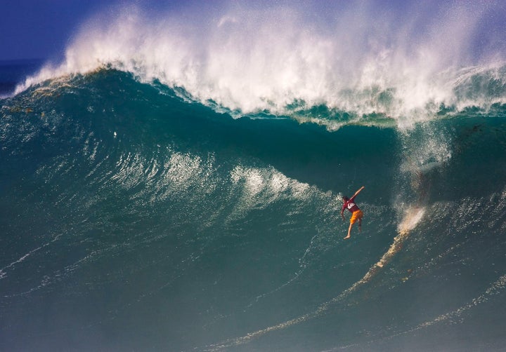 Daryl "Flea" Virotsko wipes out during the Eddie Aikau contest in 2004.