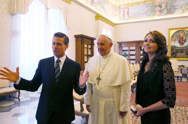 Pope Francis met with Mexican President Enrique Peña Nieto and first lady Angélica Rivera in Vatican City in 2014. The pope is scheduled to visit Mexico again on Feb. 12, just days after reports questioning the legitimacy of Rivera's annulment of a previous marriage were reported.