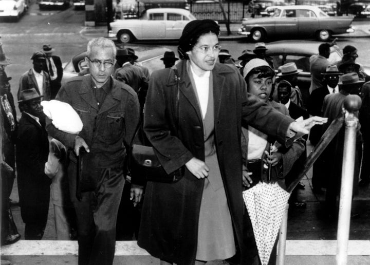 Rosa Parks, known as as the "mother of the civil rights movement," arriving at circuit court to be arraigned in the bus boycott in Montgomery, Alabama, in 1956.