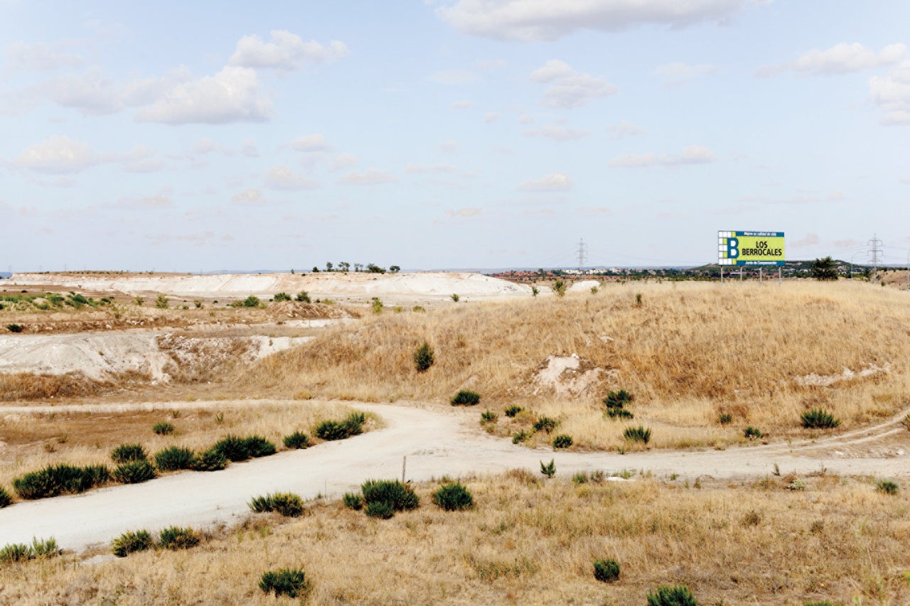 Shown here in 2014, the billboard advertising Los Berrocales was present throughout the economic downturn.