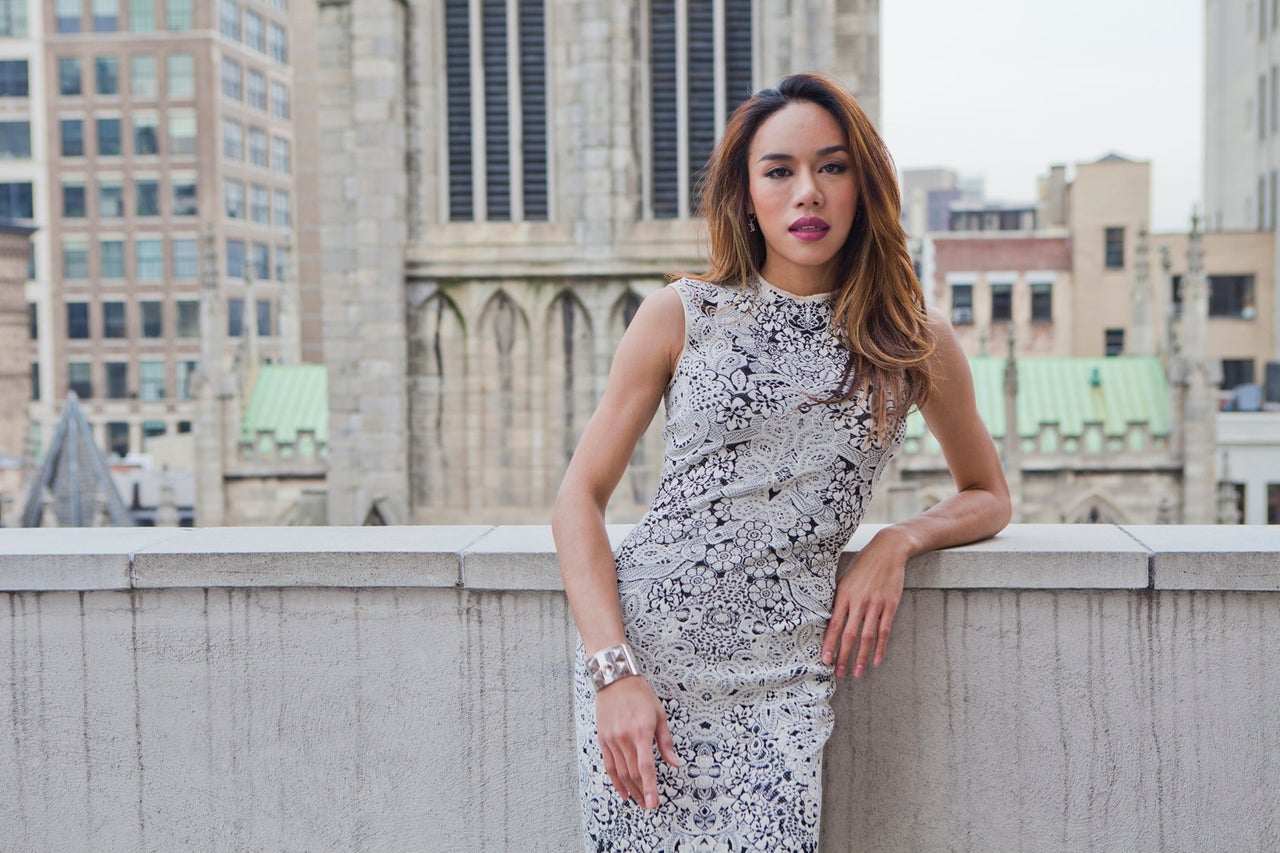 Founder Pêche Di stands on the rooftop of her Broadway office. 