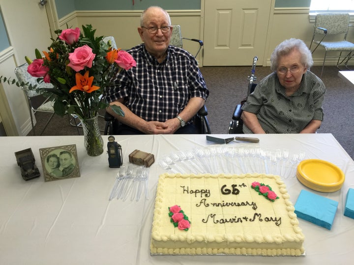 The Riddles celebrating their 65th anniversary at their assisted living facility.