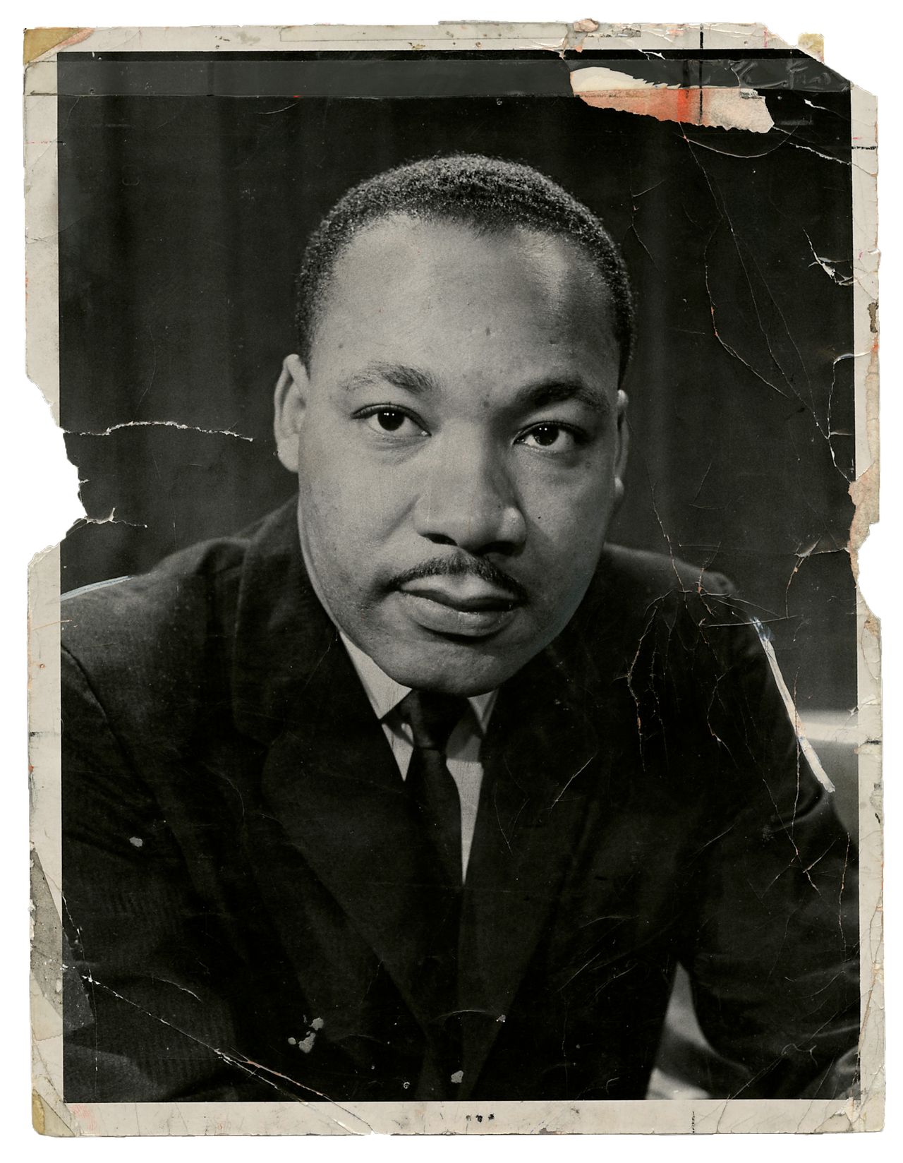 1963: An iconic portrait of the Rev. Dr. Martin Luther King Jr. was more or less shot from the hip. Allyn Baum snapped this photograph at a taping for a televised round table discussion that aired on NBC. You’d never guess, but Dr. King, looking past the viewer with a gaze for the ages, was seated at a table with four other panelists.