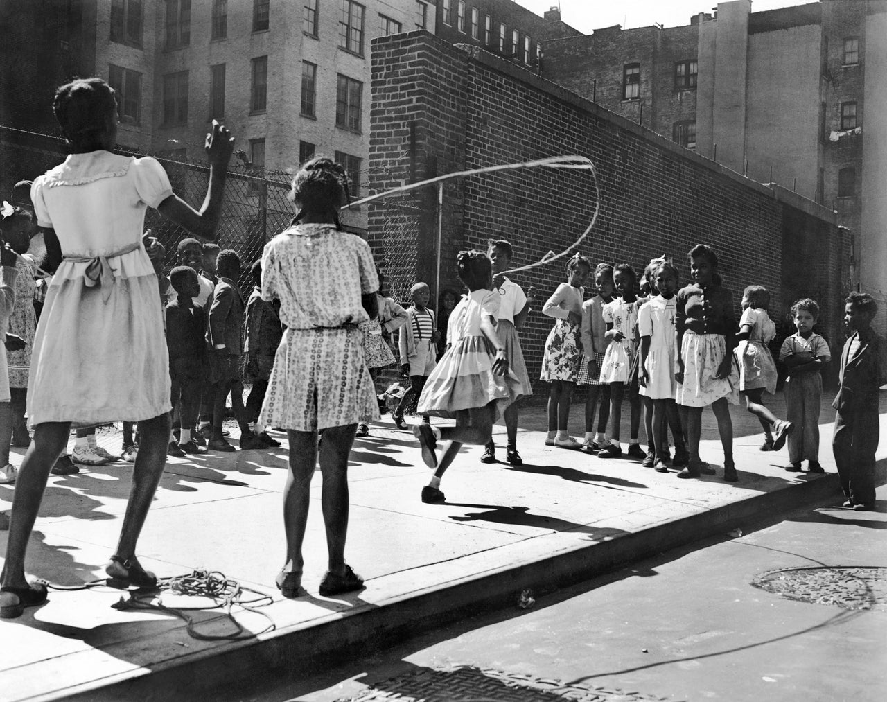 1946: Rope skipping on a block in Harlem, where Zora Neale Hurston led a group of women who were working to bring joy and "stem youthful delinquency" with activities, trips and games.