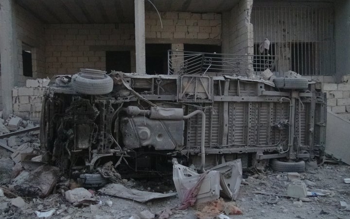 A burnt out ambulance is seen after the Sahra hospital was bombed by the Syrian Army in Idlib, Syria, on Aug. 10, 2015.