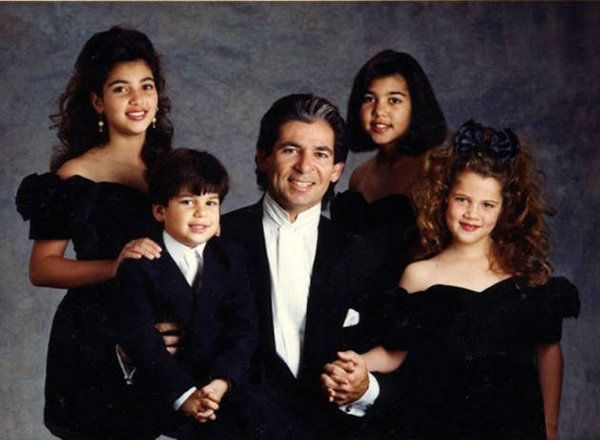 Kim, Rob, Robert, Kourtney and Khloe Kardashian pose for a Christmas card in the early 90s. 