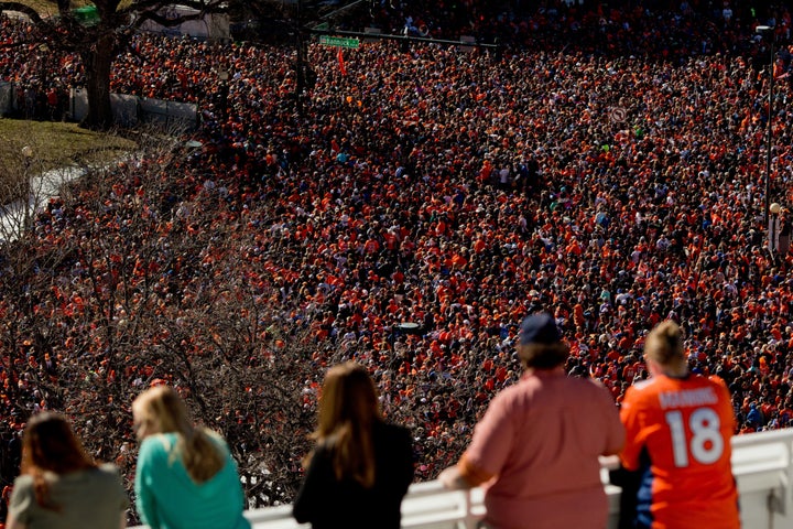 Fans of the Denver Broncos fill Civic Center Park as more watch from a balcony during a victory rally to celebrate their Super Bowl championship on Feb. 9, 2016, in Denver.