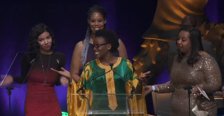 From left to right, Slack engineers Megan Anctil, Erica Baker, Kiné Camara and Duretti Hirpa accept an award for