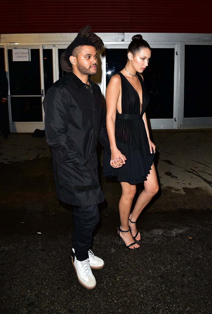 Weeknd and Bella Hadid leave the Alexander Wang fashion show at Pier 94 for on September 12, 2015 in New York City.