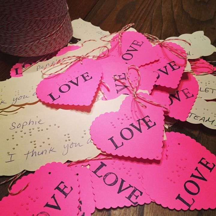 Amelia's valentines feature the word "love" in Braille.