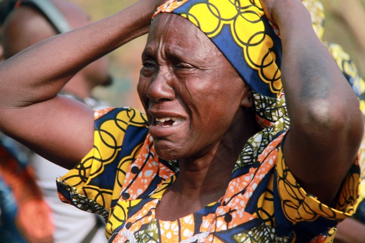 A mother cries for her daughter, who was abducted by Boko Haram in 2014. The group's attacks have continued in northeast Nigeria despite the president claiming in December that it group had been "technically defeated."