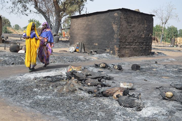 Women flee from Boko Haram attacks in Mairi village on Feb. 6. Information out of northeast Nigeria is often patchy or delayed, but attacks on remote areas of Borno state continue with alarming frequency.