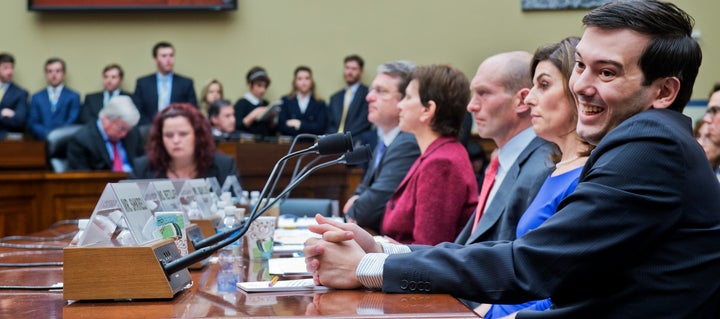 Martin Shkreli, right, former CEO of Turing Pharmaceuticals, shows off one of his <a href="https://www.huffpost.com/entry/martin-shkreli-faces_n_56b388d7e4b01d80b2456139" role="link" class=" js-entry-link cet-internal-link" data-vars-item-name="most punchable faces" data-vars-item-type="text" data-vars-unit-name="56ba326de4b08ffac122d265" data-vars-unit-type="buzz_body" data-vars-target-content-id="https://www.huffpost.com/entry/martin-shkreli-faces_n_56b388d7e4b01d80b2456139" data-vars-target-content-type="buzz" data-vars-type="web_internal_link" data-vars-subunit-name="article_body" data-vars-subunit-type="component" data-vars-position-in-subunit="10">most punchable faces</a>.