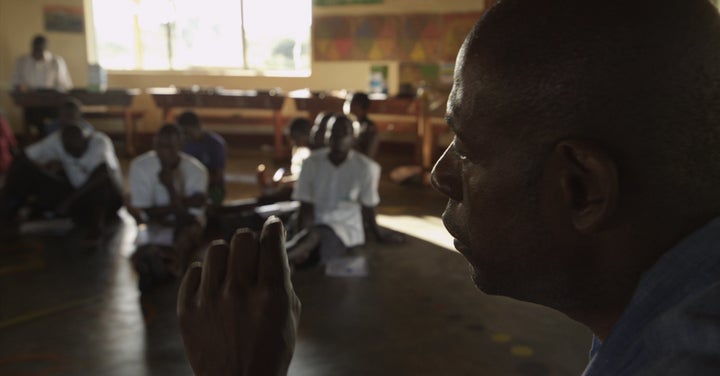 Forest Whitaker speaks with former child soldiers and orphans at Hope North, Uganda, as part of the Oscar-winning actor'