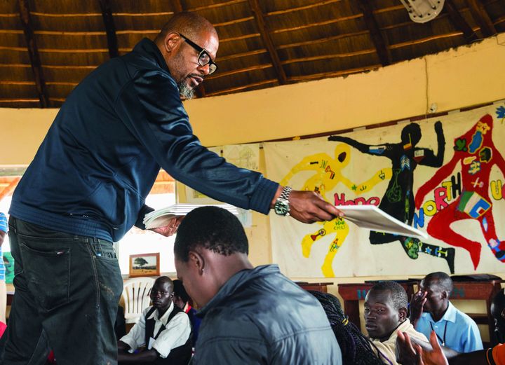 Whitaker conducts a training exercise on peace building with youth at Hope North. He started the Whitaker Peace & Development Initiative in 2012 to help youth affected by conflict.
