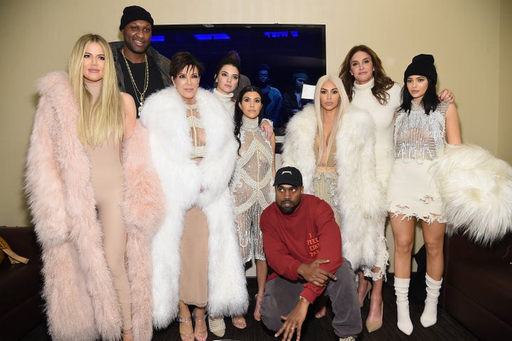 Yeezy with the entire Kardashian clan (sans Robert) and Lamar Odom. 