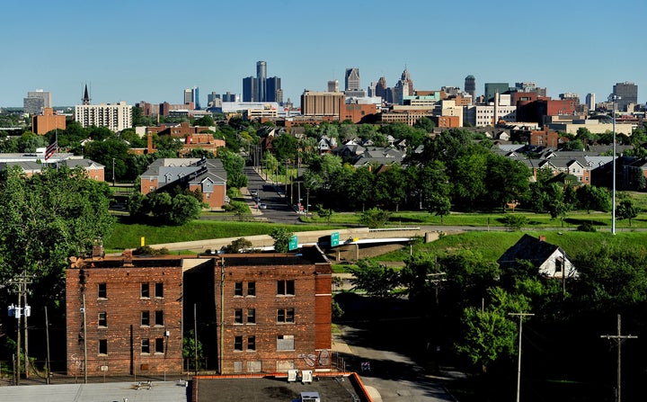 Abandoned apartment buildings and a vacant home are shown near Detroit's downtown. The city has the highest rate of vacant residential properties in the country.