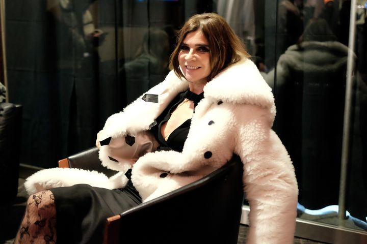 Carine Roitfeld lounging backstage at the Yeezy Season 3 fashion show. 